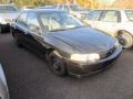 Black 2000 Mitsubishi Mirage DE Sedan