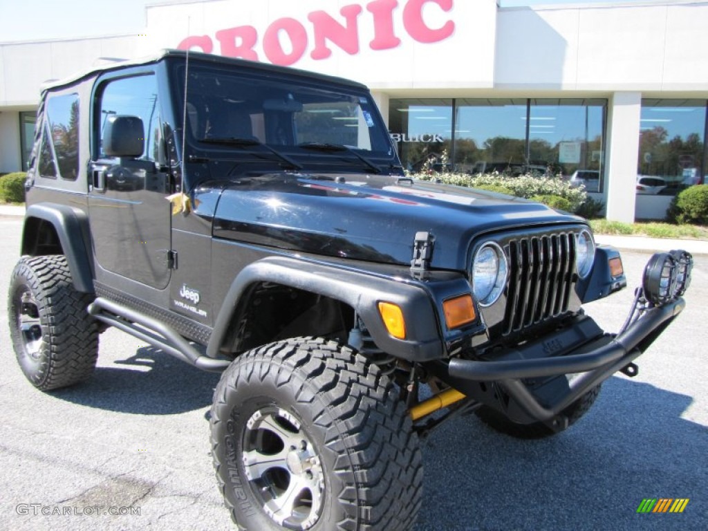 2004 Wrangler SE 4x4 - Black / Dark Slate Gray photo #1