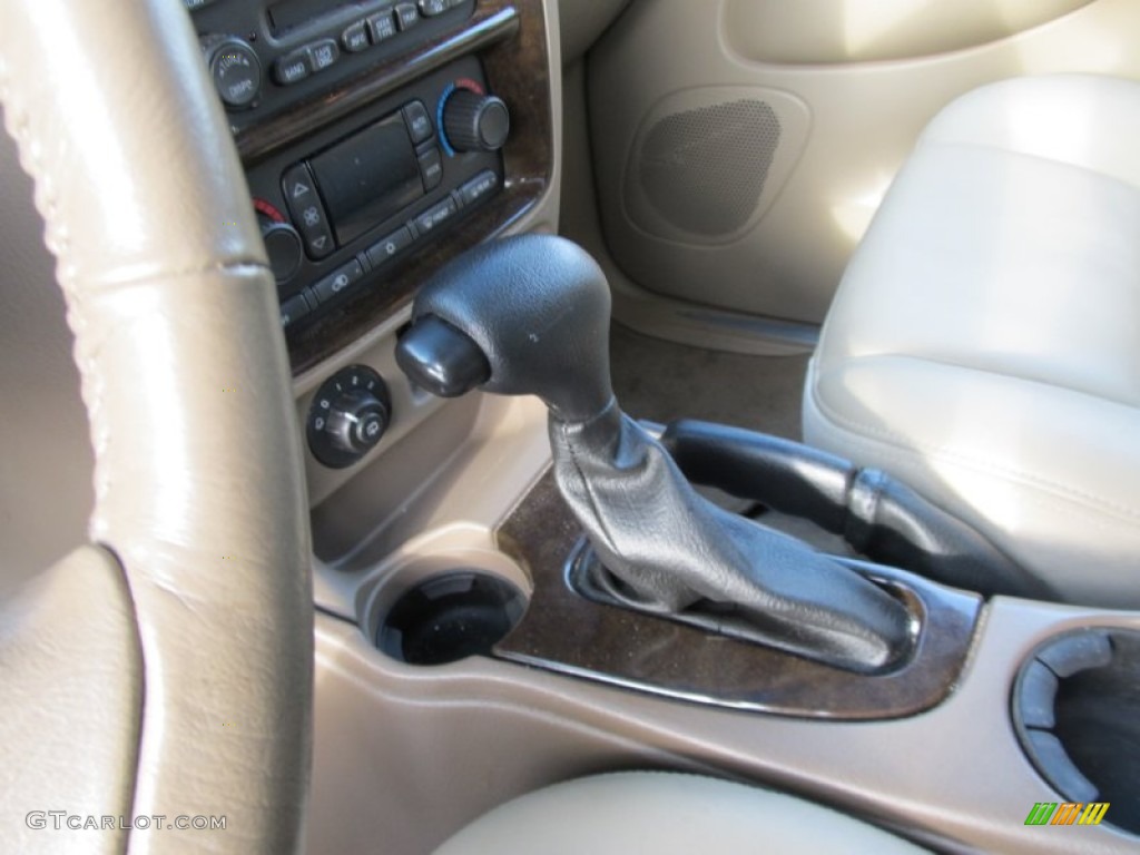 2004 Rainier CXL AWD - Olympic White / Light Cashmere photo #15