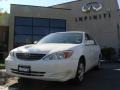Super White - Camry LE Photo No. 1