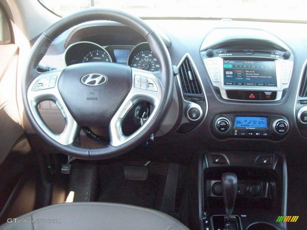 2010 Hyundai Tucson GLS Taupe Dashboard Photo #55964610