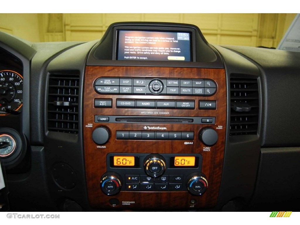 2011 Nissan Titan SL Crew Cab 4x4 Controls Photo #55965111