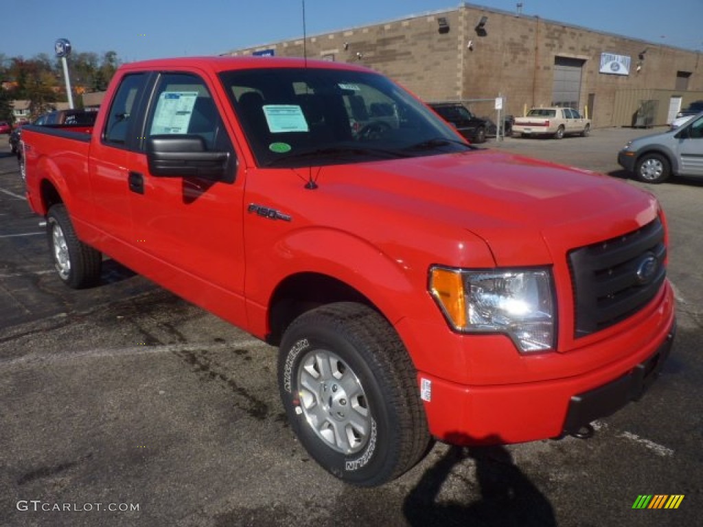 2011 F150 STX SuperCab 4x4 - Race Red / Steel Gray photo #1