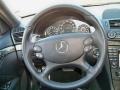 Black 2009 Mercedes-Benz E 63 AMG Sedan Steering Wheel