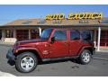 2009 Red Rock Crystal Pearl Jeep Wrangler Unlimited Sahara 4x4  photo #1