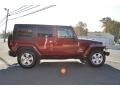 2009 Red Rock Crystal Pearl Jeep Wrangler Unlimited Sahara 4x4  photo #25