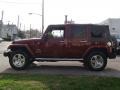 2009 Red Rock Crystal Pearl Jeep Wrangler Unlimited Sahara 4x4  photo #5