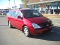 2007 Claret Red Kia Sedona LX  photo #1