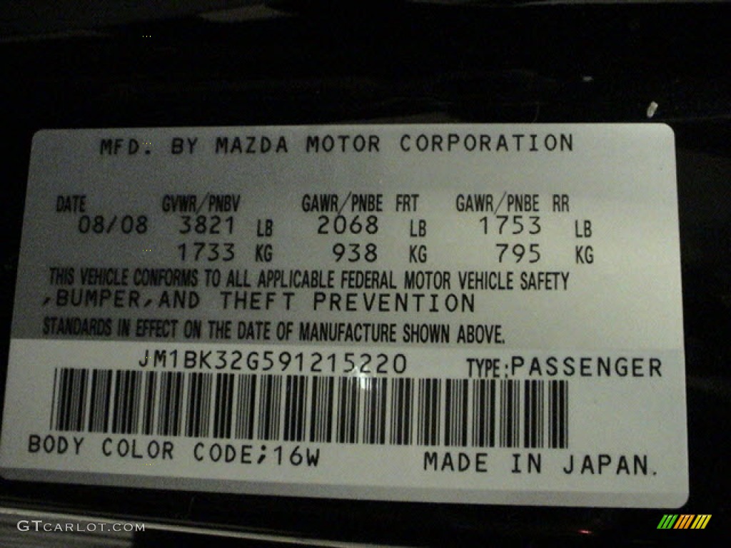 2009 MAZDA3 i Touring Sedan - Black Mica / Black photo #4