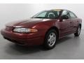 2002 Ruby Red Oldsmobile Alero GX Sedan  photo #1