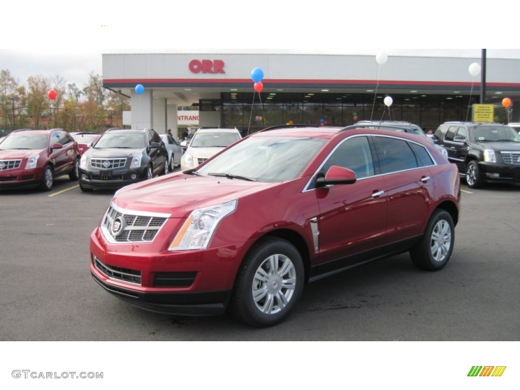 Crystal Red Tintcoat Cadillac SRX