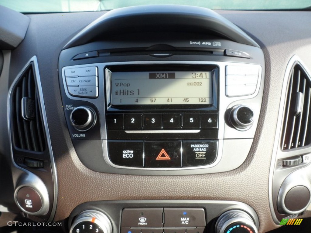 2012 Hyundai Tucson GL Controls Photo #56222300