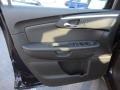 2012 Chevrolet Traverse Ebony Interior Door Panel Photo