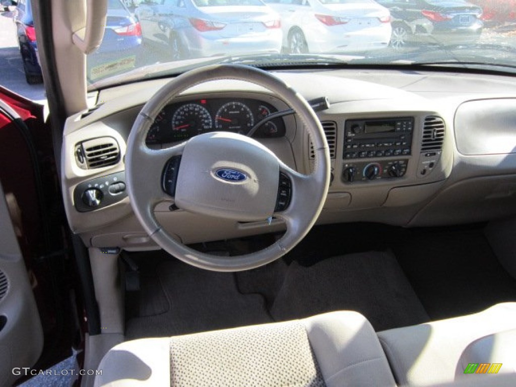 2003 F150 XLT SuperCab 4x4 - Toreador Red Metallic / Medium Parchment Beige photo #15