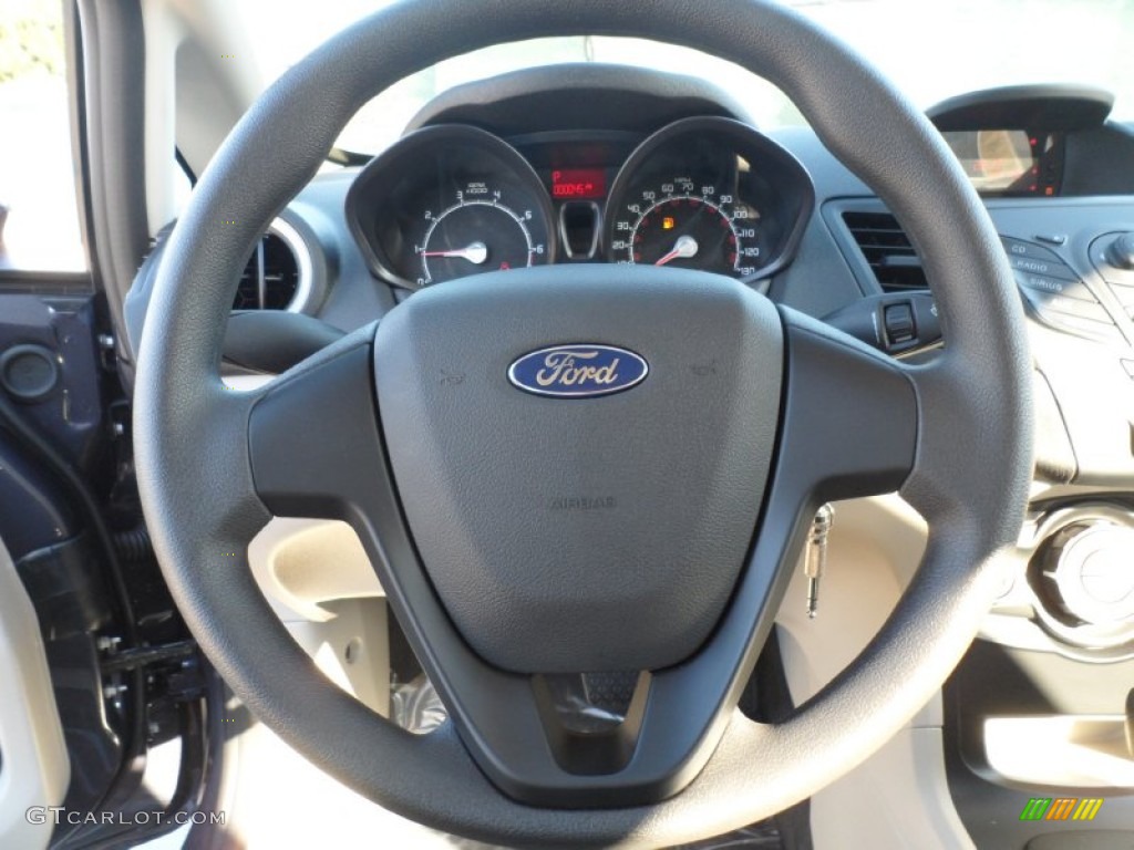 2012 Ford Fiesta S Sedan Light Stone/Charcoal Black Steering Wheel Photo #56279610