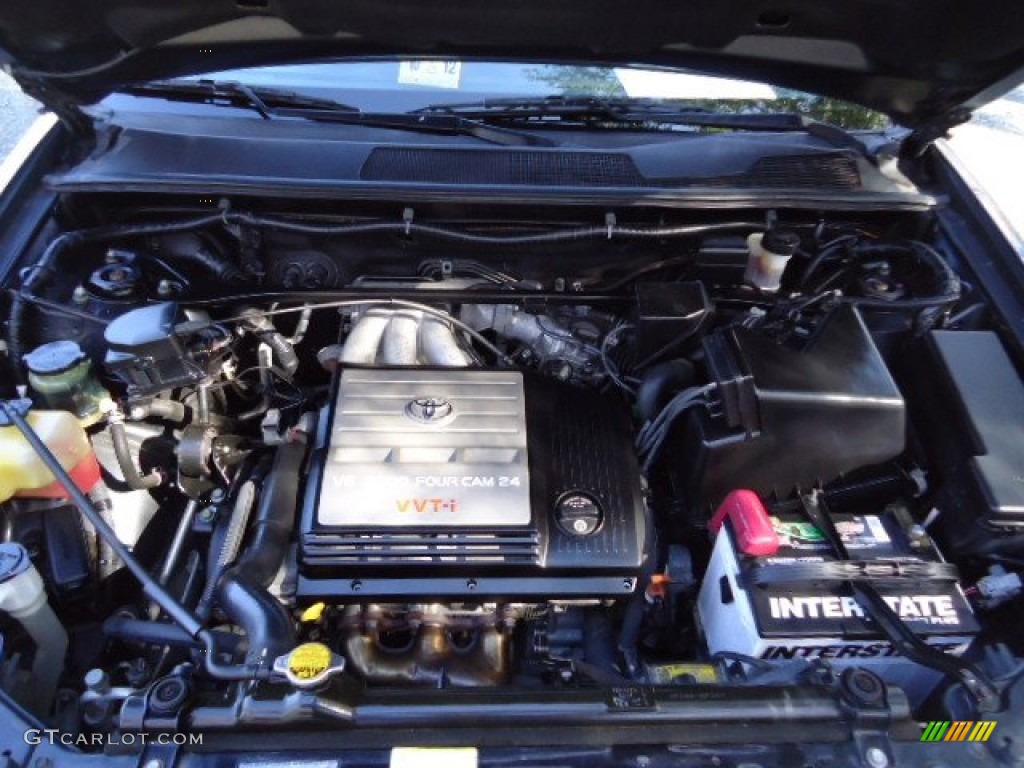 2002 Highlander V6 4WD - Electric Green Mica / Ivory photo #35