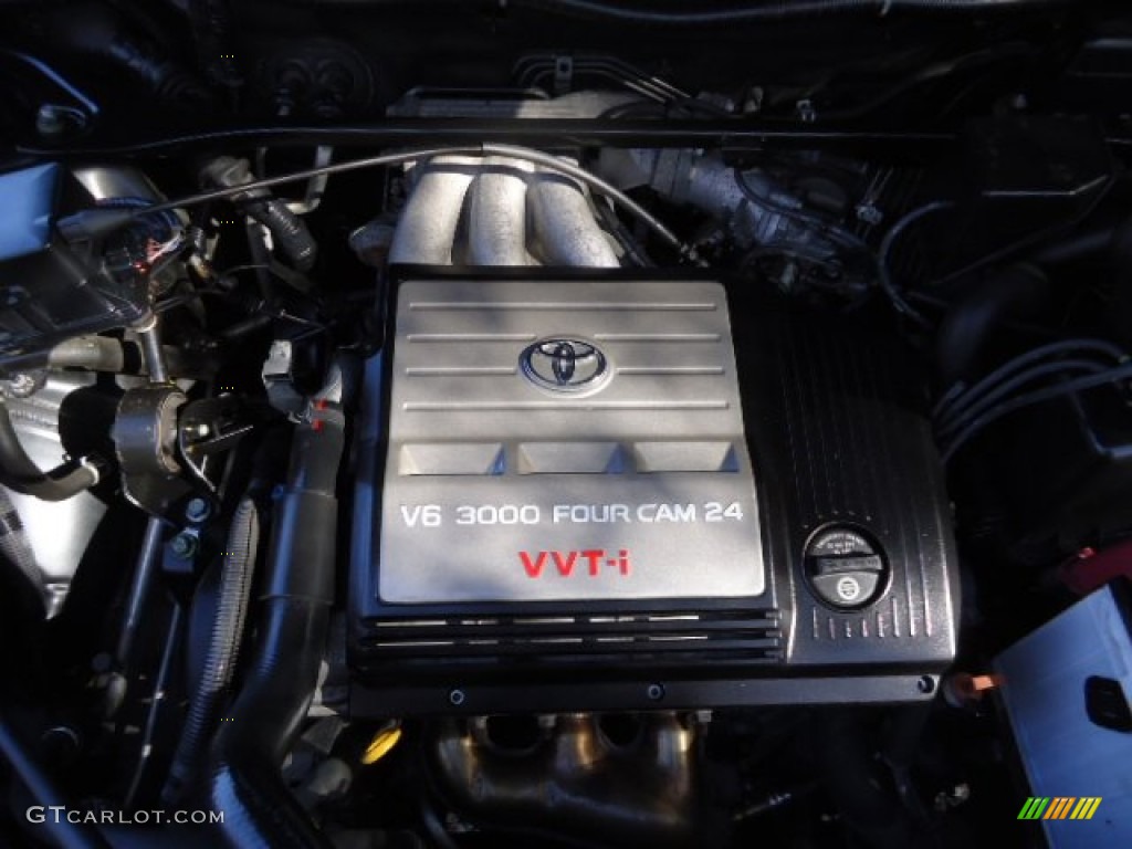 2002 Highlander V6 4WD - Electric Green Mica / Ivory photo #36