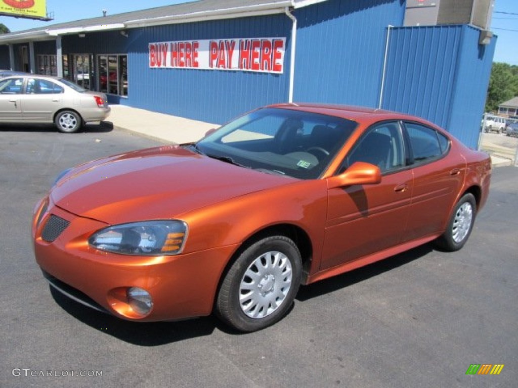 2004 Grand Prix GT Sedan - Fusion Orange Metallic / Dark Pewter photo #1