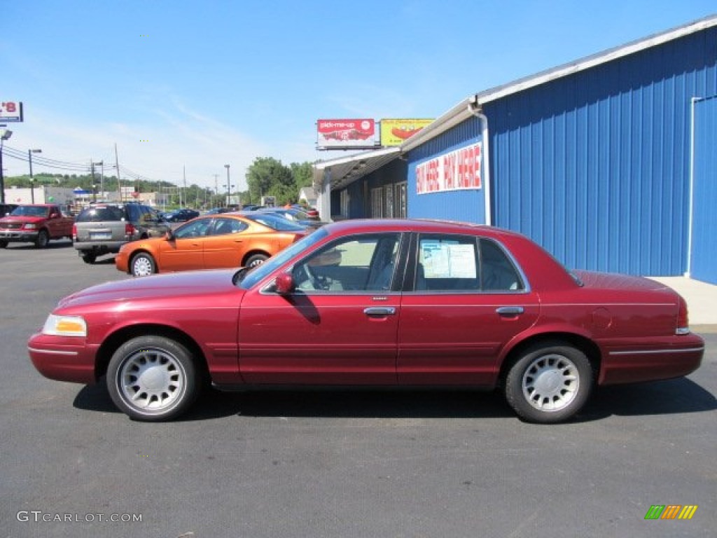 2002 Crown Victoria LX - Matador Red Metallic / Medium Parchment photo #2