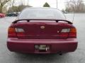 1995 Ruby Red Pearl Nissan Maxima GXE  photo #6