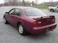 1995 Ruby Red Pearl Nissan Maxima GXE  photo #7