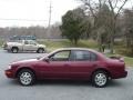 1995 Ruby Red Pearl Nissan Maxima GXE  photo #8