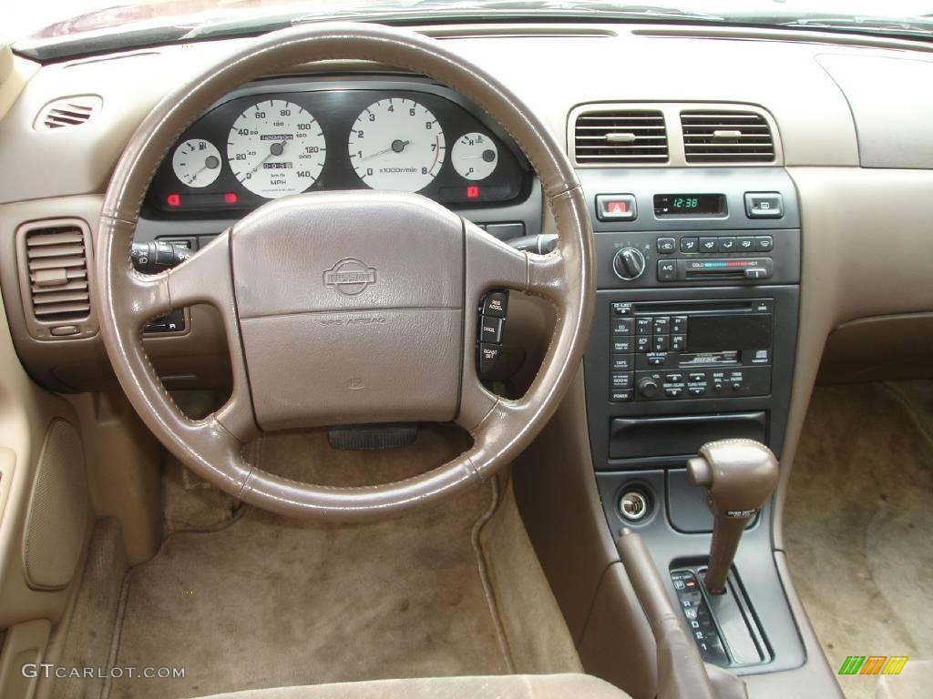 1995 Maxima GXE - Ruby Red Pearl / Beige photo #18