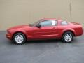 2008 Dark Candy Apple Red Ford Mustang V6 Deluxe Coupe  photo #1