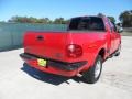 2000 Bright Red Ford F150 XLT Extended Cab 4x4  photo #2