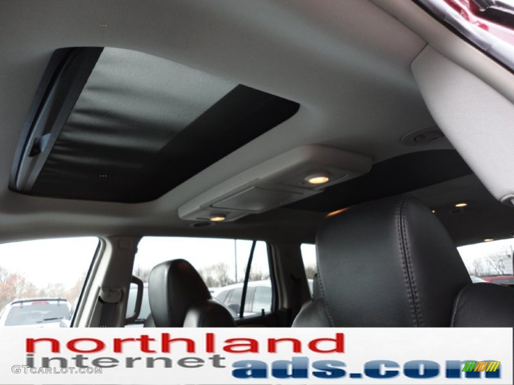 2008 Enclave CXL AWD - Dark Crimson Metallic / Ebony/Ebony photo #11