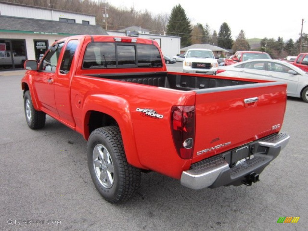 Red Orange Metallic 2012 GMC Canyon SLE Extended Cab 4x4 Exterior Photo #56420728