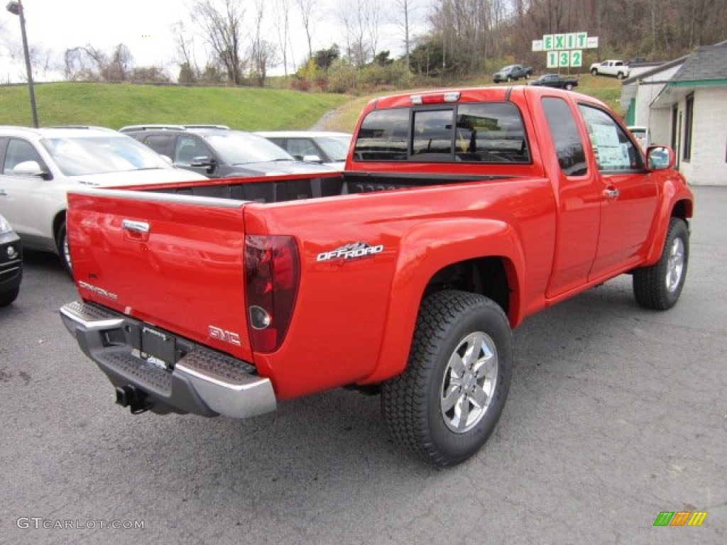 2012 Canyon SLE Extended Cab 4x4 - Red Orange Metallic / Ebony photo #7