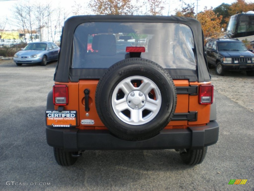 2011 Wrangler Sport 4x4 - Mango Tango Pearl / Black photo #6