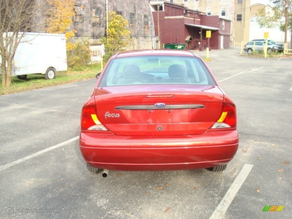 2003 Focus LX Sedan - Sangria Red Metallic / Dark Charcoal photo #5