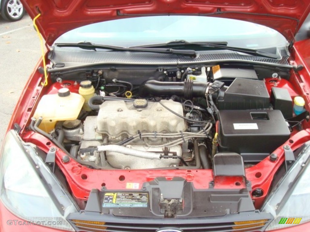 2003 Focus LX Sedan - Sangria Red Metallic / Dark Charcoal photo #21