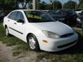 2000 Cloud 9 White Ford Focus LX Sedan  photo #1