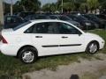 2000 Cloud 9 White Ford Focus LX Sedan  photo #10