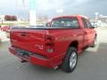 2004 Flame Red Dodge Ram 1500 SLT Sport Quad Cab 4x4  photo #5