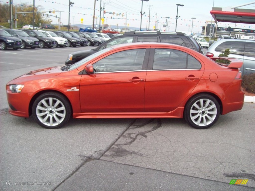 Rotor Glow Orange Metallic 2009 Mitsubishi Lancer RALLIART Exterior Photo #56488545