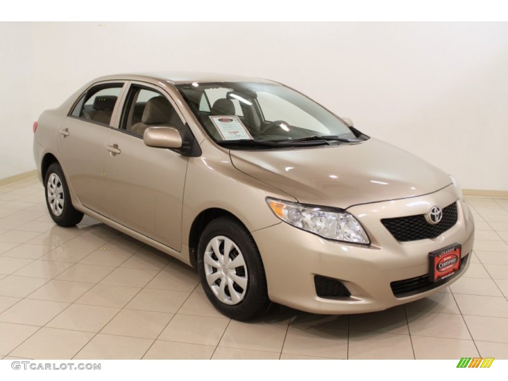 Desert Sand Metallic 2010 Toyota Corolla LE Exterior Photo #56512629