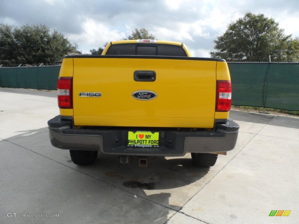 2004 F150 FX4 SuperCab 4x4 - Blazing Yellow / Black/Medium Flint photo #4