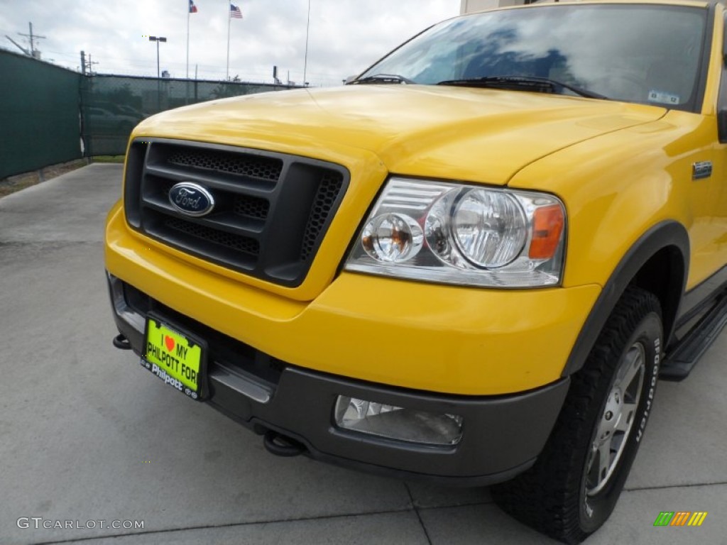 2004 F150 FX4 SuperCab 4x4 - Blazing Yellow / Black/Medium Flint photo #11