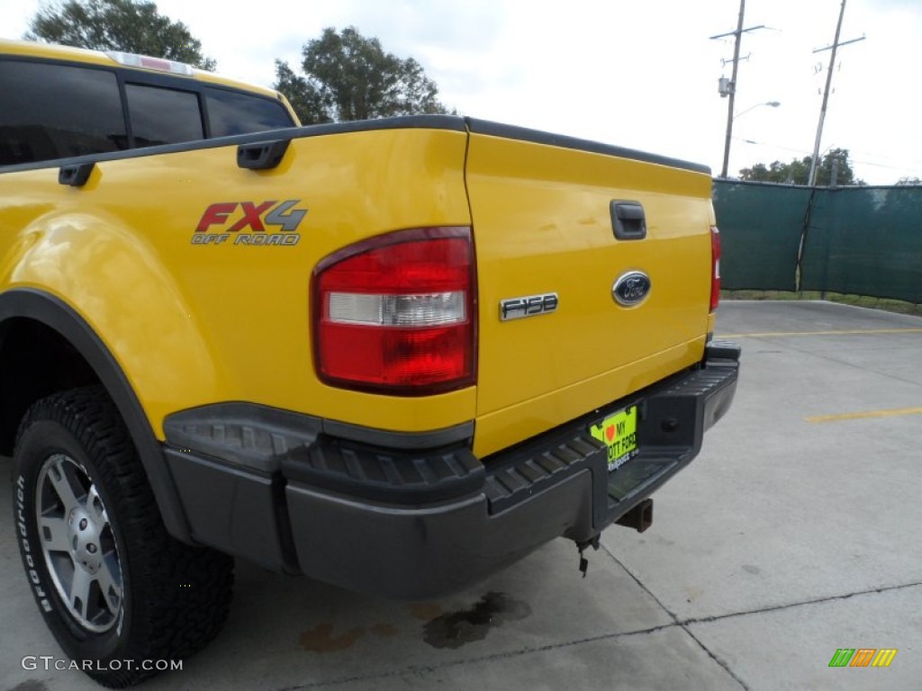 2004 F150 FX4 SuperCab 4x4 - Blazing Yellow / Black/Medium Flint photo #22