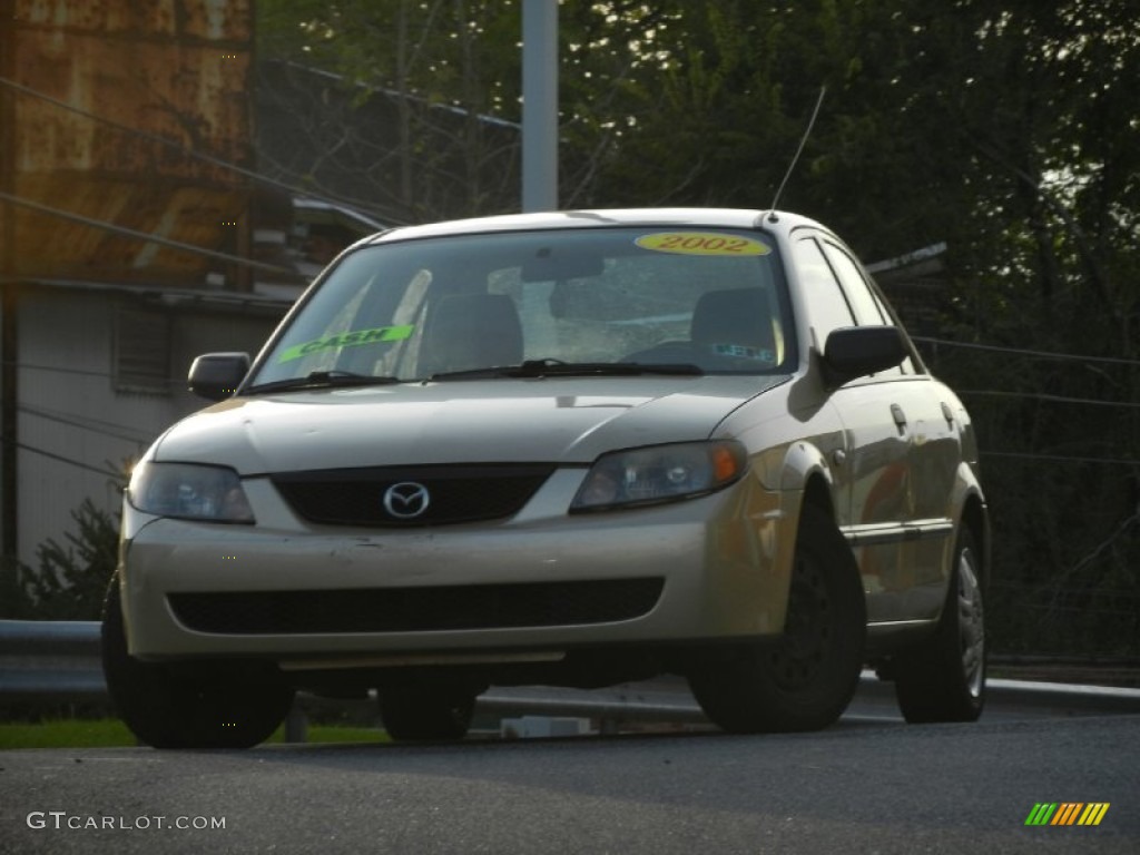 2003 Protege DX - Light Sandalwood Metallic / Gray photo #3