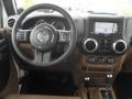 2012 Jeep Wrangler Unlimited Black/Dark Saddle Interior Dashboard Photo
