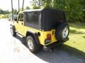 2004 Solar Yellow Jeep Wrangler Unlimited 4x4  photo #13