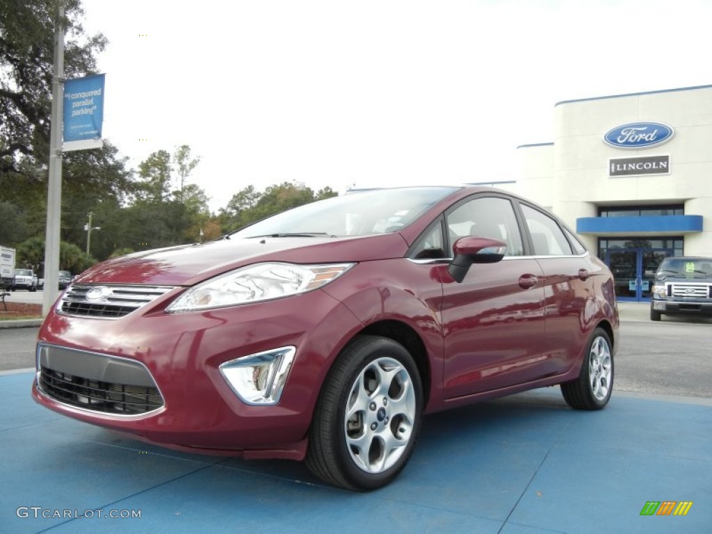 2011 Fiesta SEL Sedan - Bright Magenta Metallic / Charcoal Black/Blue Cloth photo #1