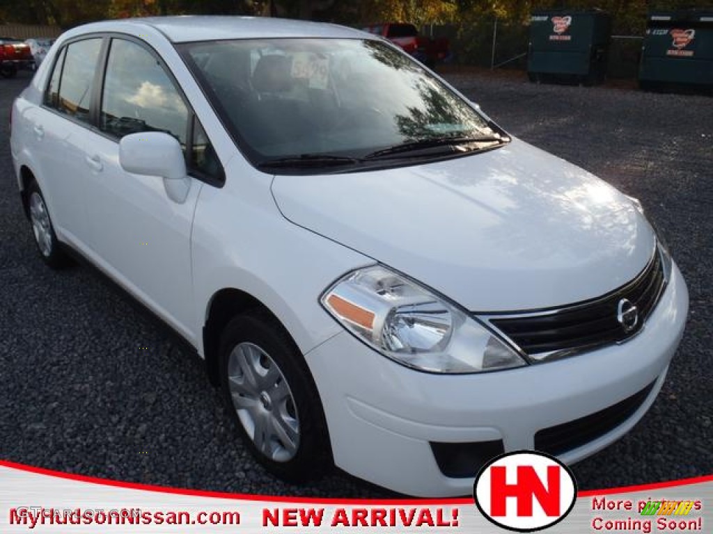 2010 Versa 1.8 S Sedan - Fresh Powder White / Charcoal photo #1