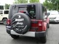 2010 Red Rock Crystal Pearl Jeep Wrangler Unlimited Sahara 4x4  photo #4