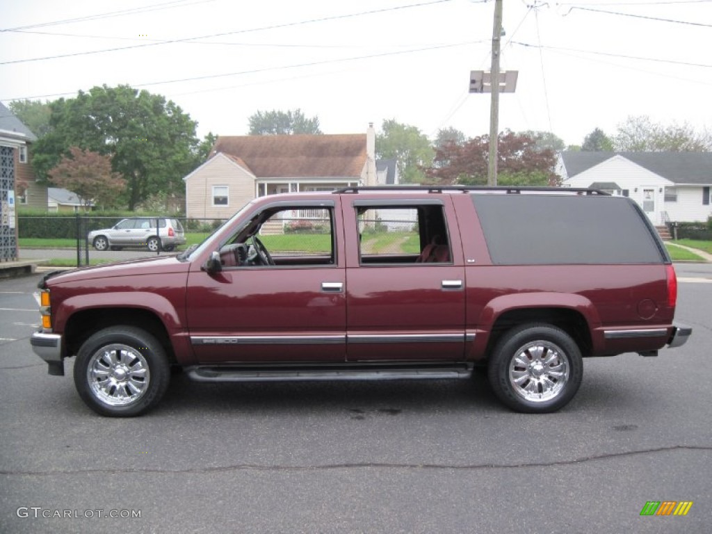 Dark Toreador Red Metallic 1998 GMC Suburban 1500 4x4 Exterior Photo #56622509
